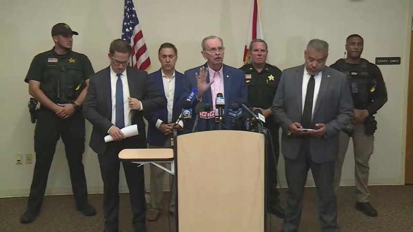 Law enforcement at press conference