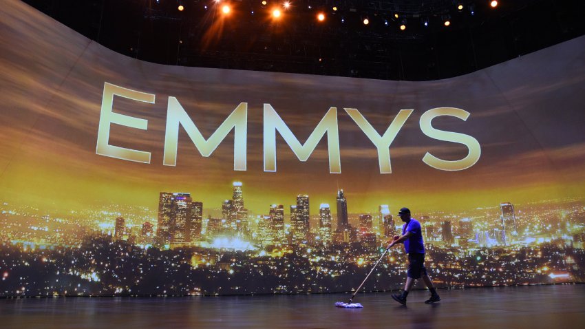 A crew member sweeps the stage during Press Preview Day for the 71st Primetime Emmy Awards