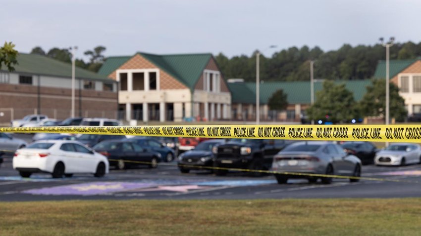 Police tape surrounds the perimeter of Apalachee High School on Sept. 5, 2024 in Winder, Georgia.