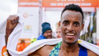 Ethiopian Dawit Wolde celebrates after winning the City-Pier-City Walk half marathon in a time of 59.57 in The Hague on March 8, 2020. (Photo by Marco DE SWART / ANP / AFP) / Netherlands OUT (Photo by MARCO DE SWART/ANP/AFP via Getty Images)