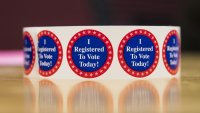 I Registered To Vote Today stickers in New Hampshire, U.S.. Photographer: Adam Glanzman/Bloomberg