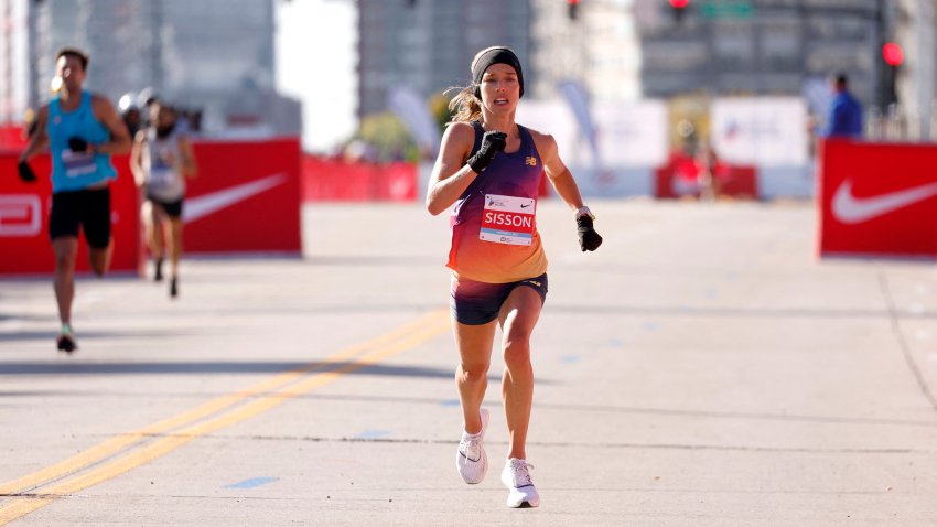 USA’s Emily Sisson approaches the finish line to place second in the women’s division of the 2022 Bank of America Chicago Marathon in Chicago, Illinois, on October 9, 2022. (Photo by KAMIL KRZACZYNSKI / AFP) (Photo by KAMIL KRZACZYNSKI/AFP via Getty Images)