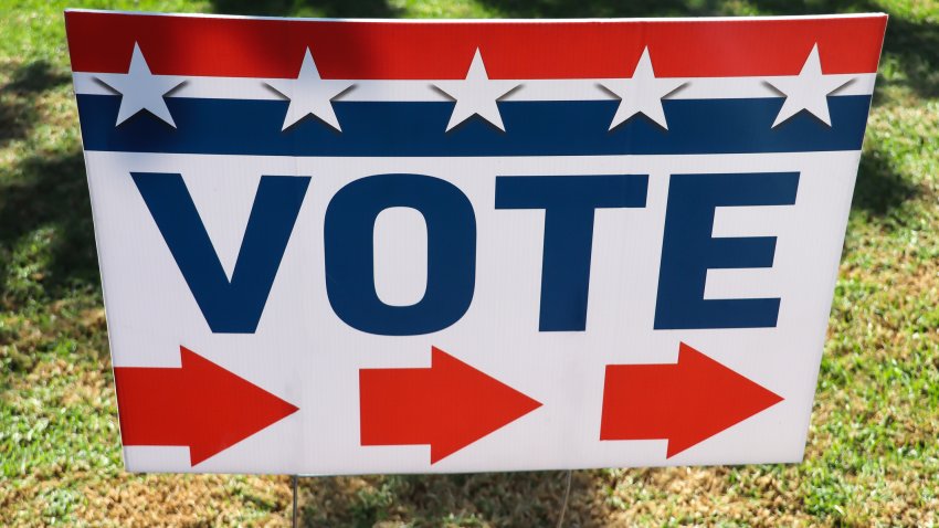 “Vote” directional sign