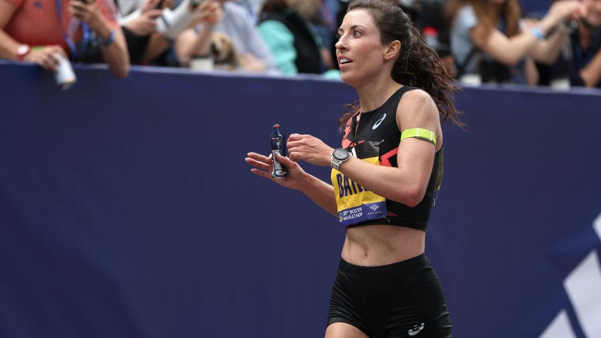 BOSTON, MASSACHUSETTS – APRIL 15: Emma Bates of the United States crosses the finish line during the 128th Boston Marathon on April 15, 2024 in Boston, Massachusetts.  (Photo by Paul Rutherford/Getty Images)