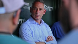 CHICAGO, IL – JUNE 17: President of Baseball Operations Jed Hoyer of the Chicago Cubs talks with reporters in the dugout before a game against the San Francisco Giants at Wrigley Field on June 17, 2024 in Chicago, Illinois. (Photo by Jamie Sabau/Getty Images)