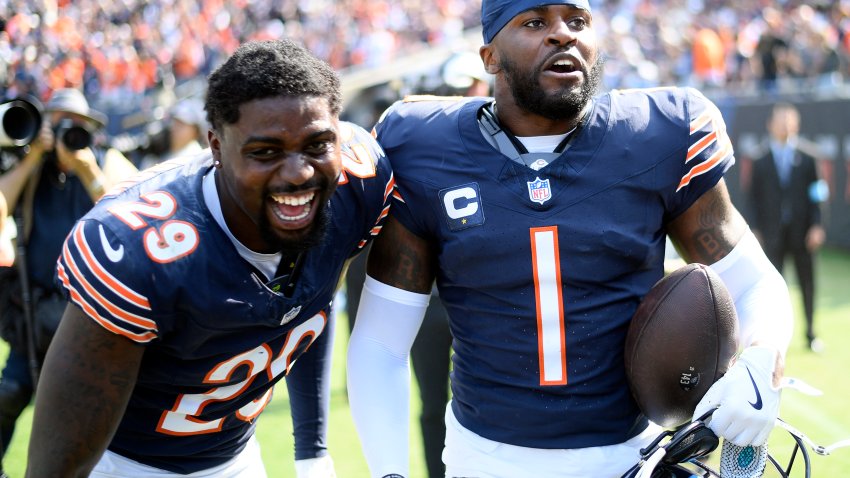 CHICAGO, ILLINOIS – SEPTEMBER 08: Tyrique Stevenson #29 of the Chicago Bears celebrates with Jaylon Johnson # after he intercepted the ball in the fourth quarter of the game against the Tennessee Titans at Soldier Field on September 08, 2024 in Chicago, Illinois. (Photo by Quinn Harris/Getty Images)