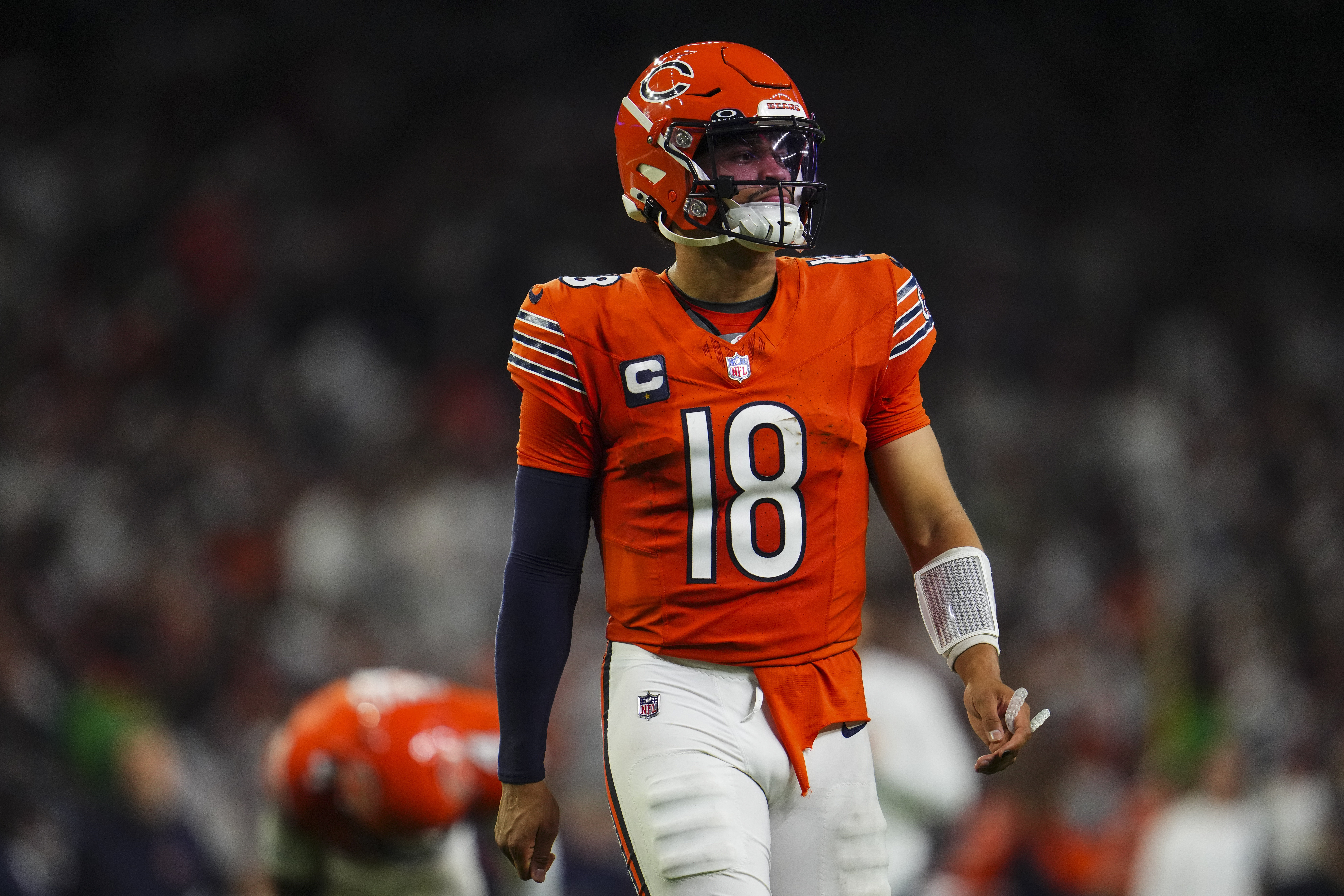 HOUSTON, TX – SEPTEMBER 15: Caleb Williams #18 of the Chicago Bears looks on from the field during an NFL football game against the Houston Texans during a football game at NRG Stadium on September 15, 2024 in Houston, Texas. (Photo by Cooper Neill/Getty Images)