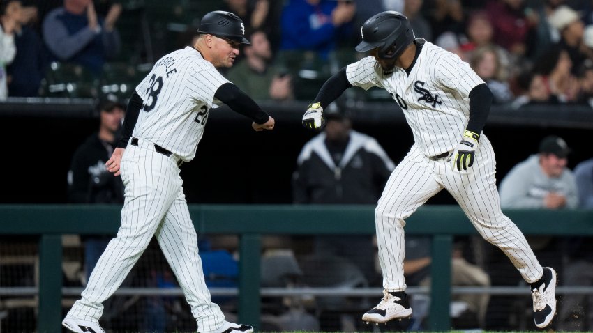 CHICAGO, ILLINOIS – SEPTEMBER 25: Lenyn Sosa #50 Justin Jirschele #28 of the Chicago White Sox celebrate a home run in the bottom of the fourth inning in a game against the Los Angeles Angels at Guaranteed Rate Field on September 25, 2024 in Chicago, Illinois. (Photo by Matt Dirksen/Getty Images)