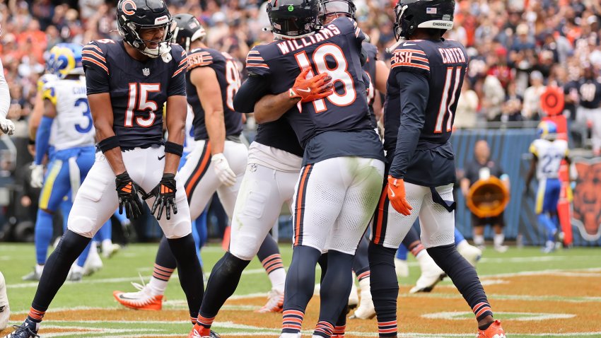 CHICAGO, ILLINOIS – SEPTEMBER 29: DJ Moore #2 and Caleb Williams #18 of the Chicago Bears celebrate after their touchdown connection against the Los Angeles Rams during the third quarter at Soldier Field on September 29, 2024 in Chicago, Illinois. (Photo by Michael Reaves/Getty Images)