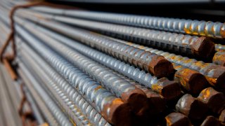 Bundles of steel from Nucor Corporation sit for sale at Thompson Building Materials in Lomita, California, on Aug. 30, 2012.