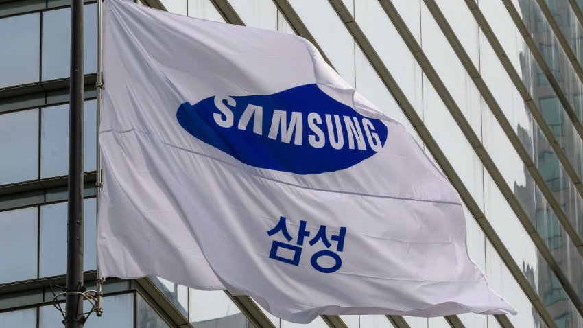 A Samsung Group flag flutters in front of the company’s Seocho building in Seoul. 