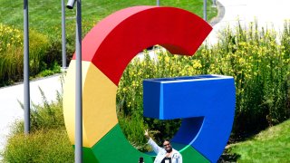 People take photos in front of a giant Google logo at Google’s Bay View campus in Mountain View, California on Aug 13, 2024 where the “Made by Google” media event was held today.