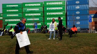 Members of the International Longshoremen’s Association union, which represents roughly 45,000 workers, stand outside Columbia Container Services on strike in Elizabeth, New Jersey, U.S., October 1, 2024. 