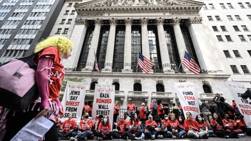 Pro-Palestinian protesters stage a demonstration outside New York Stock Exchange building in New York, United States on October 14, 2024. 