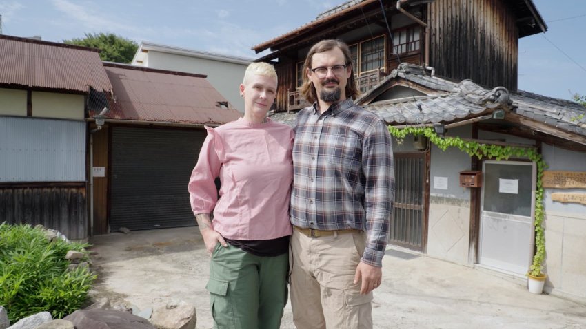 Dani and Evan Benton in front of Benton Guesthouse.