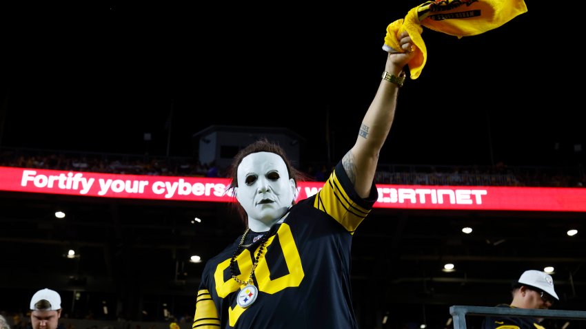 A Pittsburgh Steelers fan is seen wearing a Michael Myers Halloween mask