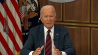 Joe Biden speaks at a desk