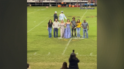 WATCH: Navy father surprises daughter at homecoming game