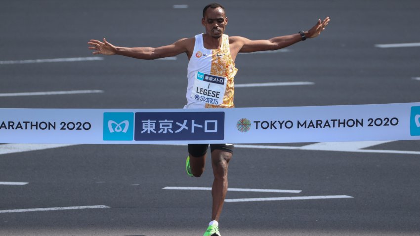 TOKYO, JAPAN – MARCH 01: Birhanu Legese #1 of Ethiopia celebrates as he crosses the finish line to win the men’s competition during the Tokyo Marathon on March 01, 2020 in Tokyo, Japan. The organizer had restricted the entry to elite runners only as the marathon acts as the final domestic qualifying for the Tokyo Olympic Games men’s marathon due to the COVID-19 new coronavirus outbreak. (Photo by Takashi Aoyama/Getty Images)