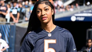 CHICAGO, ILLINOIS – OCTOBER 06: Angel Reese of the Chicago Sky looks on before the game between the Carolina Panthers and the Chicago Bears at Soldier Field on October 06, 2024 in Chicago, Illinois. (Photo by Quinn Harris/Getty Images)