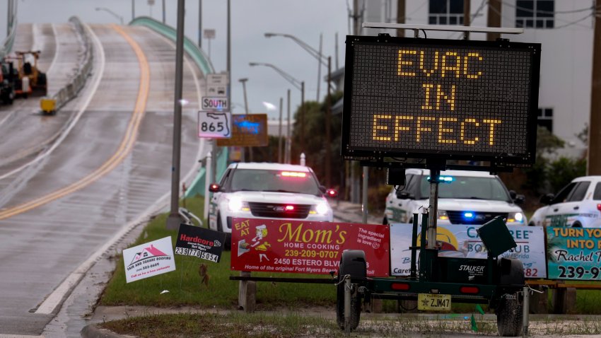 FORT MYERS, FLORIDA – OCTOBER 08: A sign indicates that an evacuation order is in effect for the beach area before Hurricane Milton’s arrival on October 08, 2024, in Fort Myers, Florida. People are preparing for the storm, which could be a Cat 3 when it makes landfall on Wednesday evening. (Photo by Joe Raedle/Getty Images)