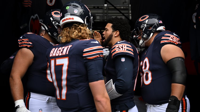 LONDON, ENGLAND – OCTOBER 13: Caleb Williams of Chicago Bears interacts with his teammates prior to the NFL match between Jacksonville Jaguars and Chicago Bears at Tottenham Hotspur Stadium on October 13, 2024 in London, England. (Photo by Harry Murphy/Getty Images)