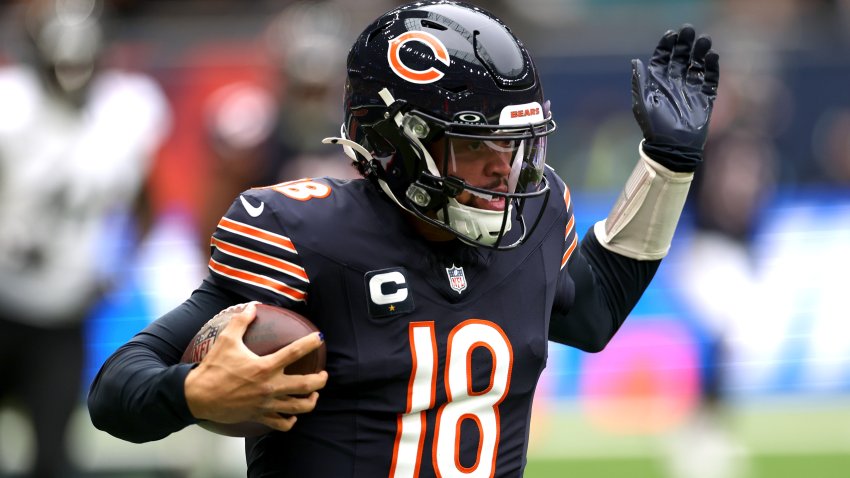 LONDON, ENGLAND – OCTOBER 13: Caleb Williams of Chicago Bears runs with the ball during the NFL match between Jacksonville Jaguars and Chicago Bears at Tottenham Hotspur Stadium on October 13, 2024 in London, England. (Photo by Richard Heathcote/Getty Images)