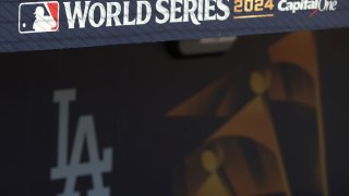 LOS ANGELES, CALIFORNIA – OCTOBER 24: World Series 2024 signage is seen in the Los Angeles Dodgers dugout during workout day ahead of Game 1 of the 2024 World Series at Dodger Stadium on October 24, 2024 in Los Angeles, California. (Photo by Katharine Lotze/Getty Images)