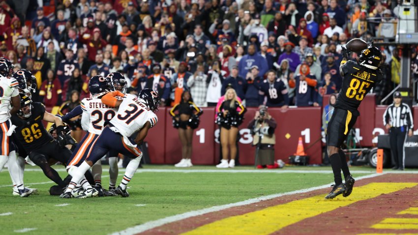 LANDOVER, MARYLAND – OCTOBER 27: Noah Brown #85 of the Washington Commanders catches a game winning touchdown pass against the Chicago Bears at Northwest Stadium on October 27, 2024 in Landover, Maryland. (Photo by Scott Taetsch/Getty Images)