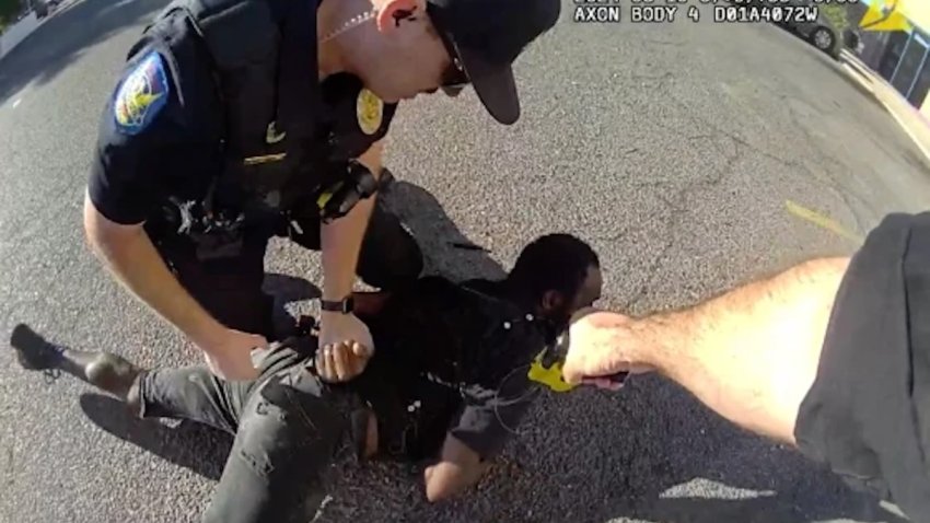 Phoenix police officers shock Tyron McAlpin with a Taser on Aug. 19.