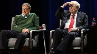 Billionaires Bill Gates and Warren Buffett speak with journalist Charlie Rose at an event organized by Columbia Business School on Jan. 27, 2017, in New York.