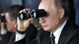 Russia’s President Vladimir Putin overseeing military exercises known as “Center-2019” at a firing range Donguz in the Orenburg region of Russia on Sept. 20, 2019.