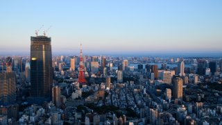 The Tokyo Tower, left, and commercial and residential buildings in Minato district of Tokyo, Japan, on Saturday, Oct. 1, 2022. Photographer: Akio Kon/Bloomberg via Getty Images