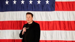 Tesla CEO and X owner Elon Musk, who supports Republican presidential nominee former U.S. President Donald Trump, gestures as he speaks about voting during an America PAC Town Hall in Folsom, Pennsylvania, U.S., October 17, 2024.