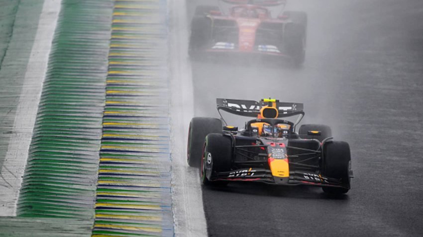 Sergio Perez of Mexico driving the (11) Oracle Red Bull Racing RB20 leads Carlos Sainz of Spain driving (55) the Ferrari SF-24 on track  during the F1 Grand Prix of Brazil at Autodromo Jose Carlos Pace on November 03, 2024 in Sao Paulo, Brazil.