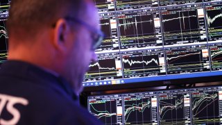 Traders work on the floor of the New York Stock Exchange during the morning trading on November 07, 2024 in New York City. 