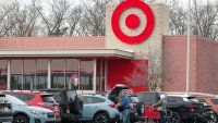 People are seen at the parking lot of a Target store in Selinsgrove. 