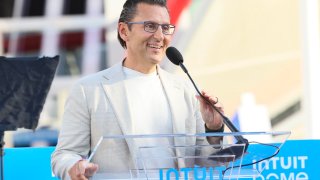 Intuit CEO Sasan Goodarzi speaks at the opening night of the Intuit Dome in Los Angeles on Aug. 15, 2024.