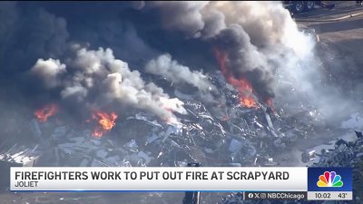 Crews battle large fire at Joliet scrapyard