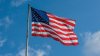 Police: Woman beat 72-year-old neighbor, ran down street waving American flag