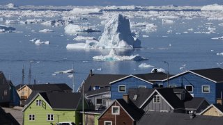 File. Icebergs drift by in Disko Bay on July 16, 2024 at Ilulissat, Greenland.