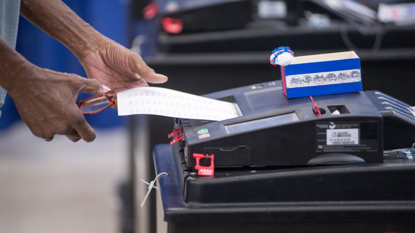 CHICAGO, ILLINOIS, UNITED STATES – OCTOBER 3:A voter casts their ballot during early voting for the Presidential General Election at the Voting Supersite in Downtown Chicago, Illinois on October 3, 2024. Voters can cast their ballots in one of 12 languages. (Photo by Jacek Boczarski/Anadolu via Getty Images)