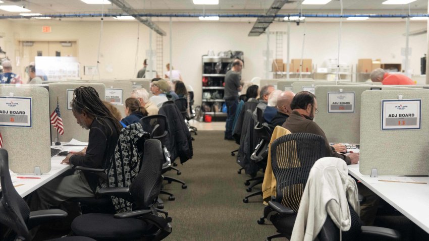 Election workers tabulate and adjudicate remaining ballots at Maricopa County Tabulation and Election Center in Phoenix, Arizona, on November 6, 2024. (Photo by Rebecca NOBLE / AFP) (Photo by REBECCA NOBLE/AFP via Getty Images)