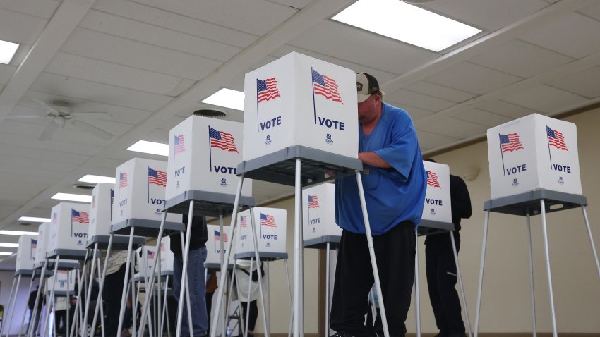 OAK CREEK, WISCONSIN – NOVEMBER 05: Wisconsin voters cast their ballots at the American Legion Hall on November 05, 2024 in Oak Creek, Wisconsin. Americans cast their ballots today in the presidential race between Republican nominee former President Donald Trump and Democratic nominee Vice President Kamala Harris, as well as multiple state elections that will determine the balance of power in Congress. (Photo by Stacy Revere/Getty Images)