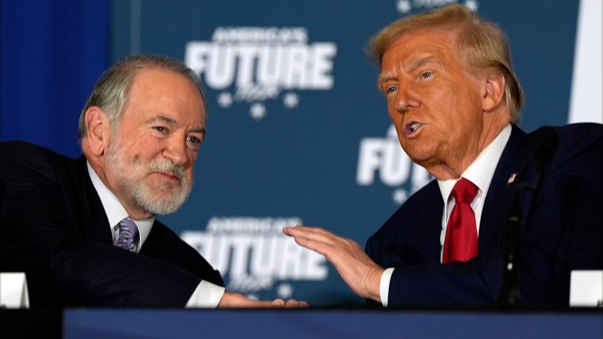 Donald Trump with former Arkansas Gov. Mike Huckabee during a roundtable on Oct. 29, 2024, in Drexel Hill, Pa.