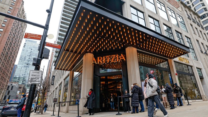 CHICAGO, ILLINOIS – NOVEMBER 29:  Shoppers wait in line to enter newly opened women’s clothing store Aritzia on Michigan Avenue on Black Friday on November 29, 2024 in Chicago, Illinois. Black Friday marks the official start of the holiday shopping season. (Photo by Kamil Krzaczynski/Getty Images)