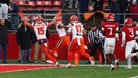 PISCATAWAY, NEW JERSEY – NOVEMBER 23: Pat Bryant #13 of the Illinois Fighting Illini scores a touchdown during the fourth quarter of their game against the Rutgers Scarlet Knights at SHI Stadium on November 23, 2024 in Piscataway, New Jersey. (Photo by Ed Mulholland/Getty Images)