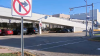 Car plunges from parking garage at suburban mall, nearby streets closed