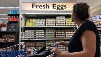 A customer walks by a display of fresh eggs at a grocery store on Sept. 25, 2024 in San Anselmo, California.