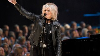 FILE – Lucinda Williams performs at the MusiCares Person of the Year tribute honoring Tom Petty in Los Angeles, Feb. 10, 2017.